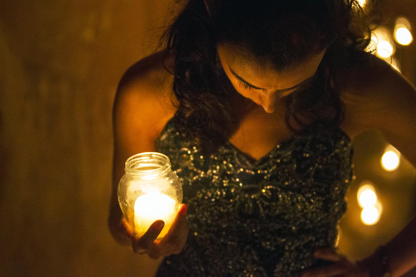 Norah-Jane Noone holds a candle