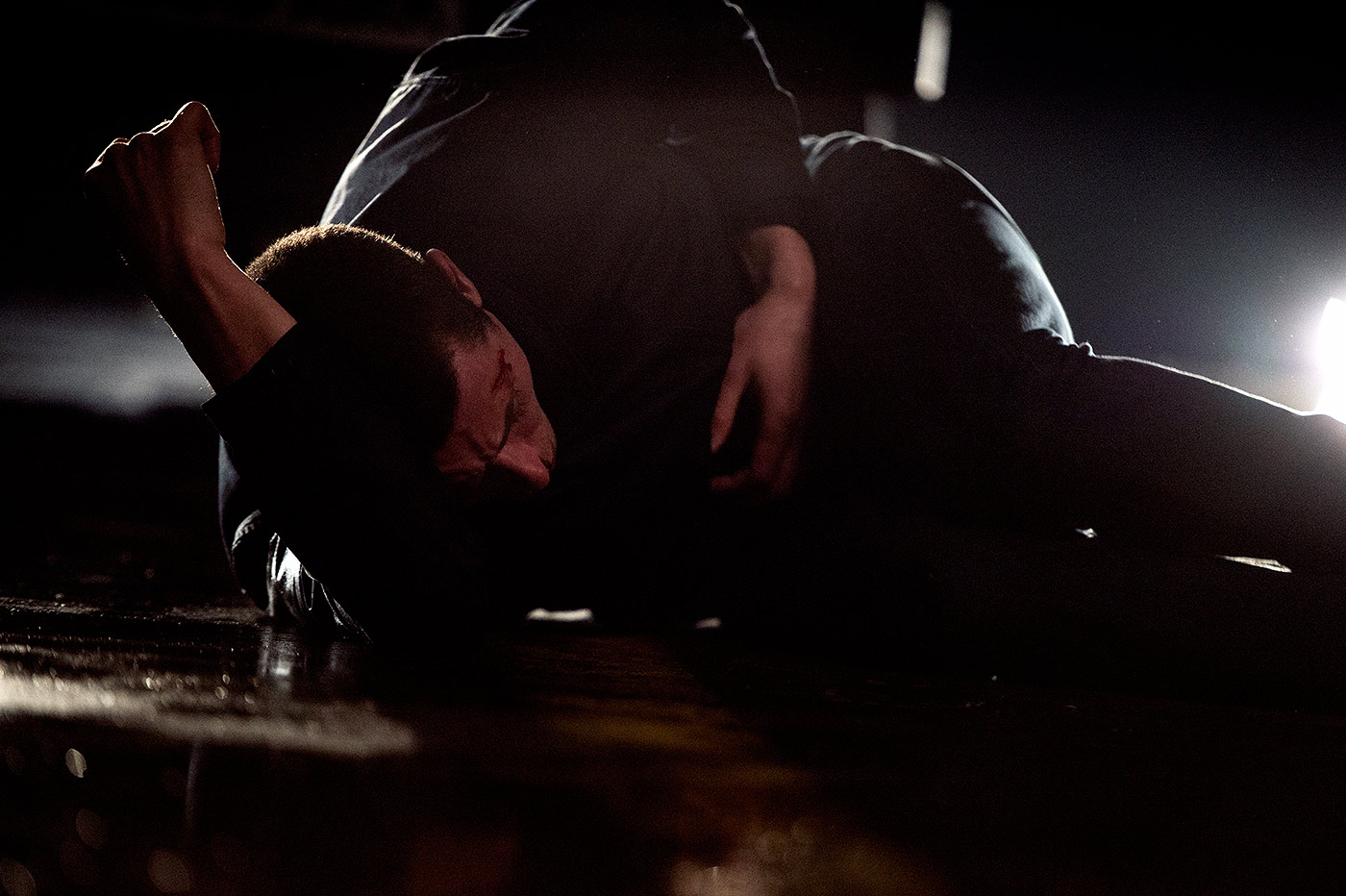 Lachlan Nieboer lies on the ground hurt